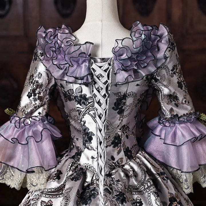 Purple lace corset bodice with metallic brocade panels, laced front and ruffled cuffs