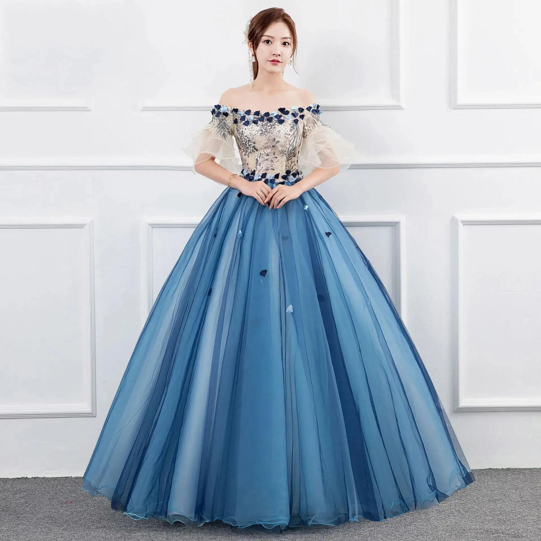 Blue off-shoulder ball gown with lace bodice and sheer puff sleeves, full skirt