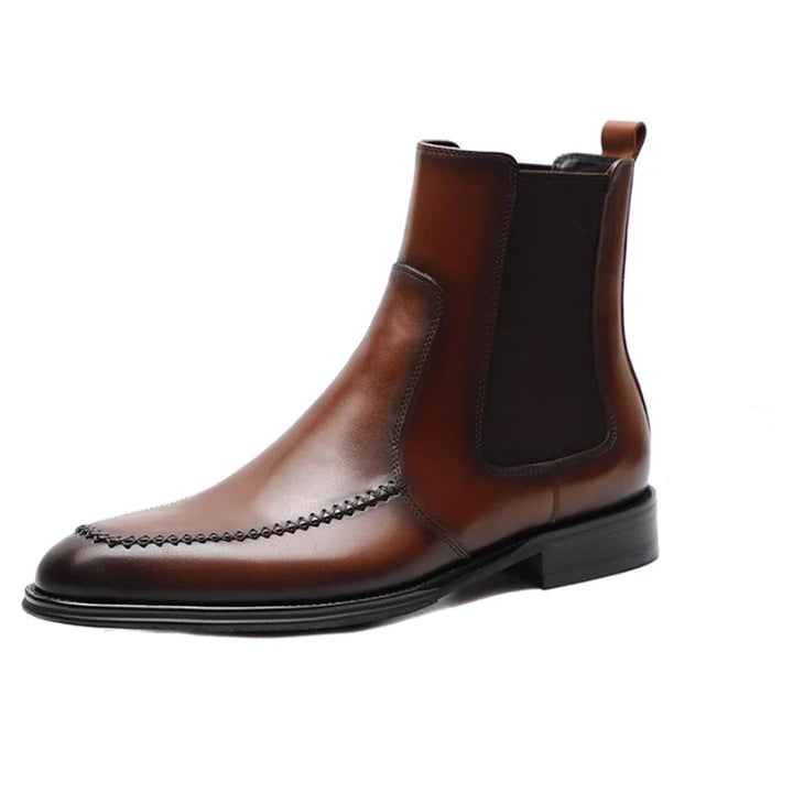 Brown leather Chelsea boot with measurements on a white background
