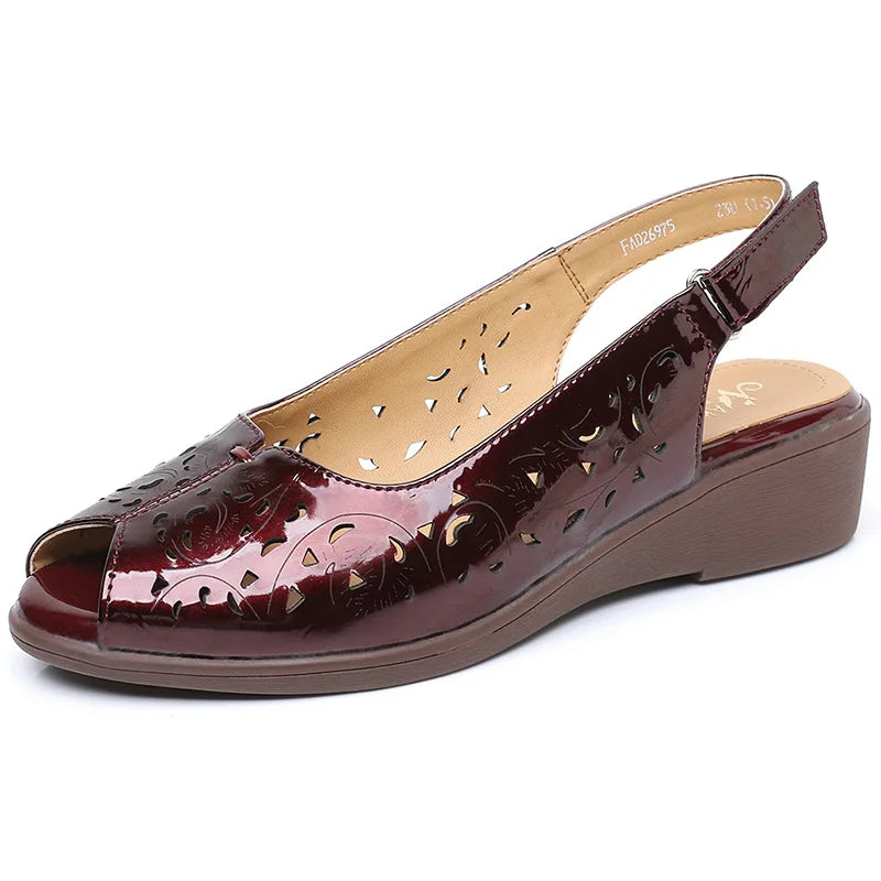 Wine red open-toe slingback wedge sandal with perforated glossy leather upper