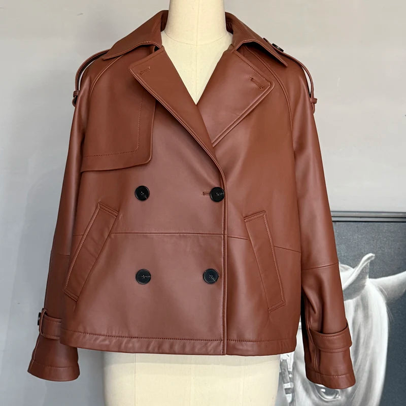 Women’s leather coat front view, wide lapel, patch pockets, double-breasted buttons