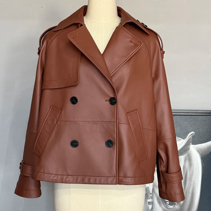 Women’s leather coat front view, wide lapel, patch pockets, double-breasted buttons