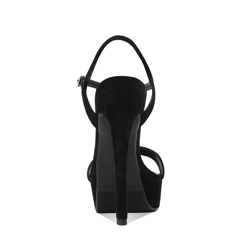 Black suede platform heeled sandals with ankle strap and open toe