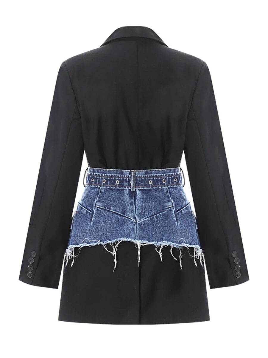 Back view of black slim denim jacket with blue denim yoke panel and button details
