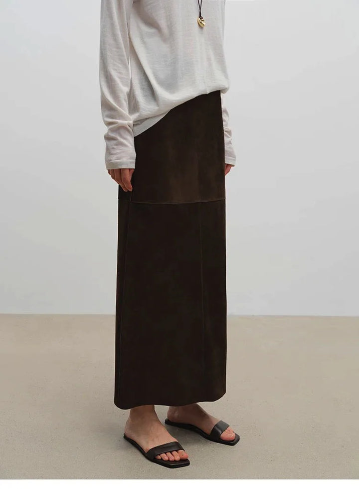 Women’s suede maxi skirt in dark brown with straight silhouette and center seam panel