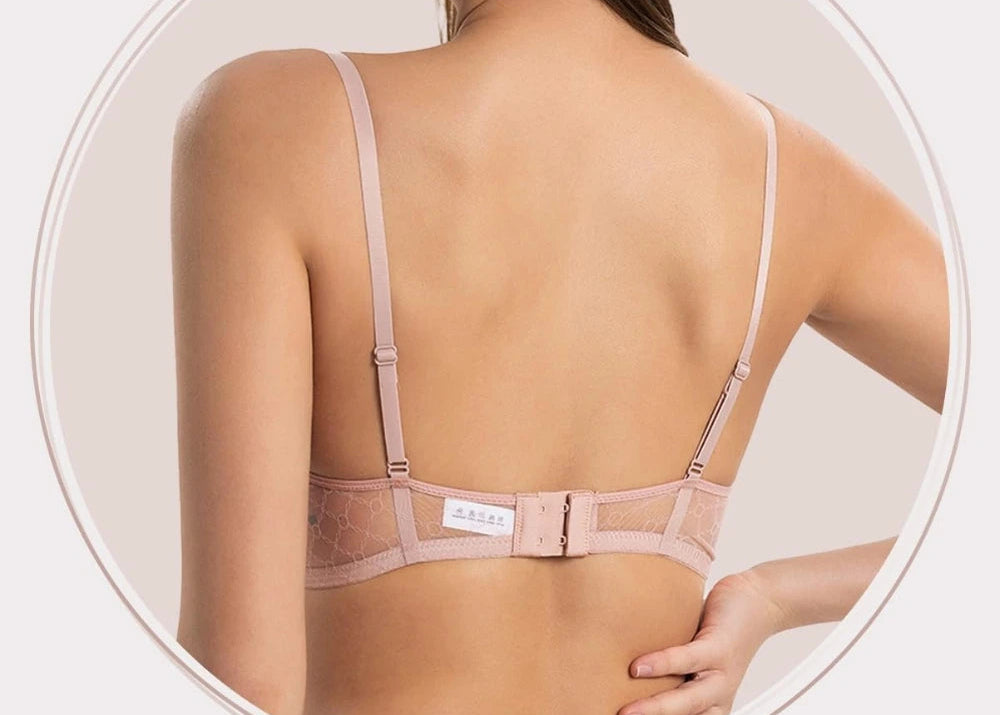 Back view of light pink women's silk bra with adjustable straps and double hook closure