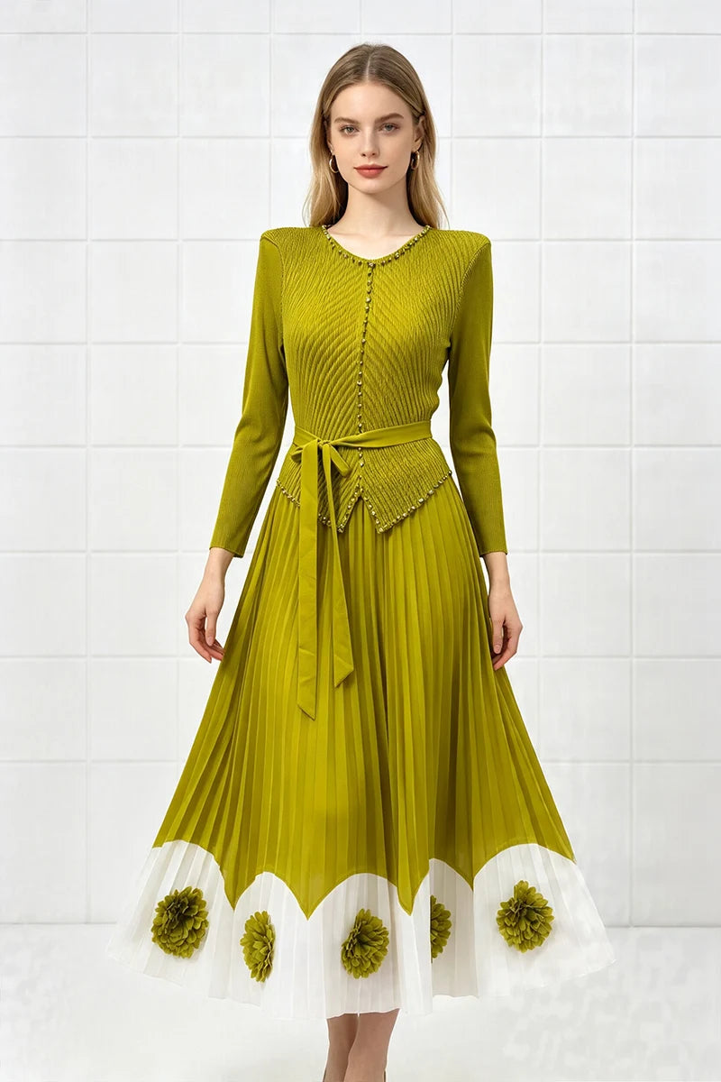 Lime green pleated midi party dress with long sleeves, tie waist, scalloped pom hem.