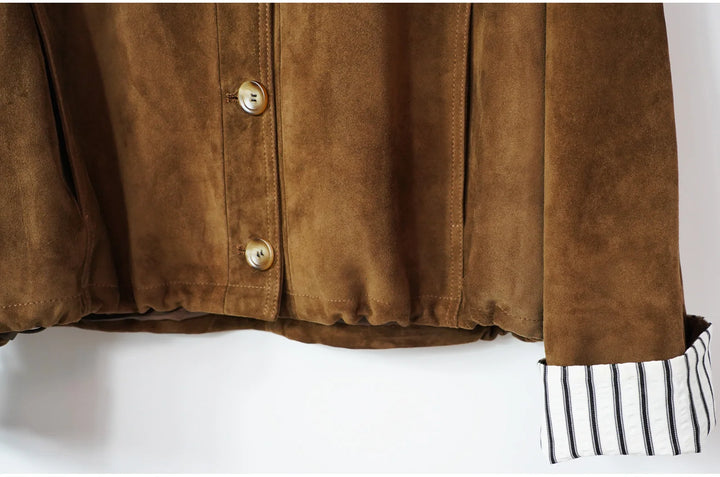 Brown suede coat hem with striped ribbed cuff trim and button placket