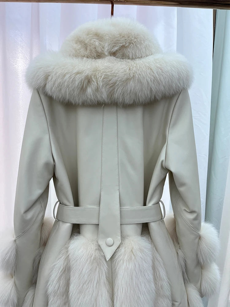 Beige leather coat back with faux fur collar, belt ties, and fur hem panel.