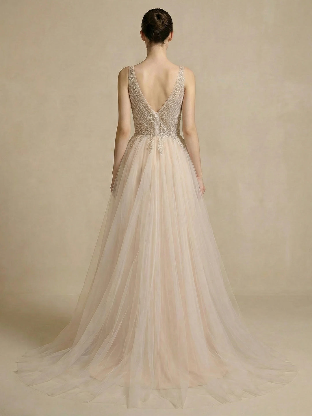 Ivory A-line bridal gown open-back V-neck mesh with tulle skirt and beaded waist