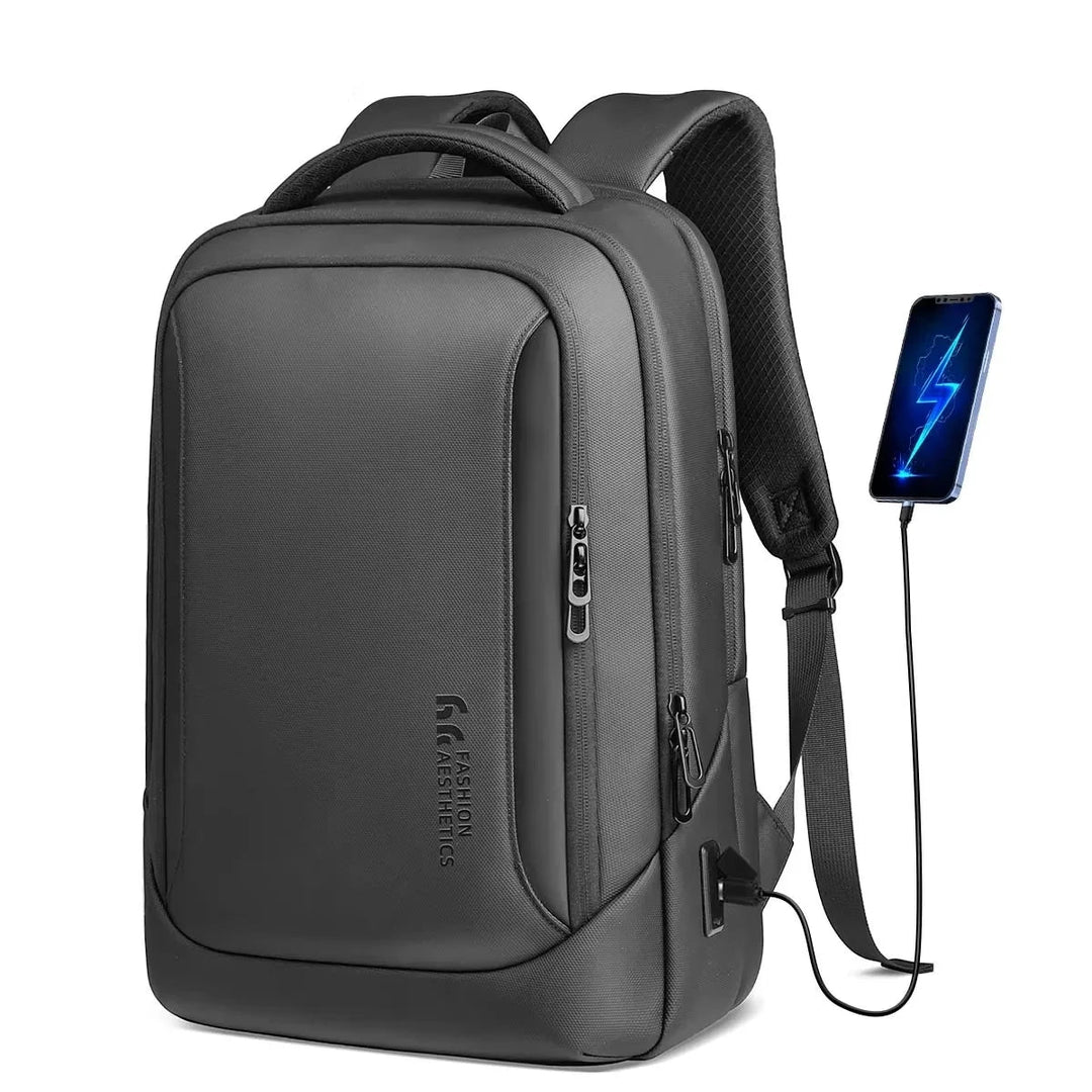Dark gray waterproof backpack with front zipper pocket and padded shoulder straps
