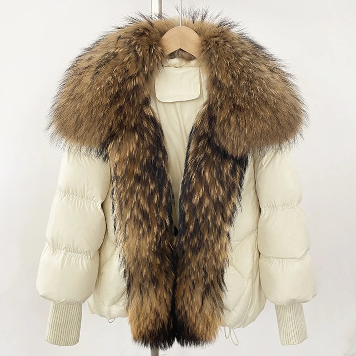 Cream puffer coat with oversized brown faux-fur collar and front zip, rib-knit cuffs