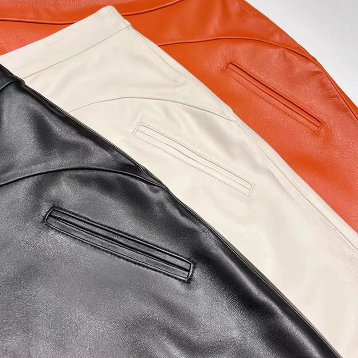 High-waist leather mini skirt pocket detail on black and light cream