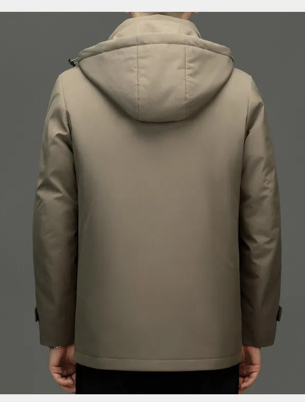 Beige hooded jacket on a gray background with text 'Assad is in love with Assad'.