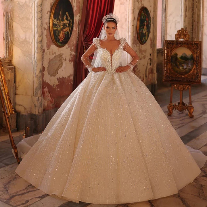 Robe de mariée élégante à manches longues et paillettes