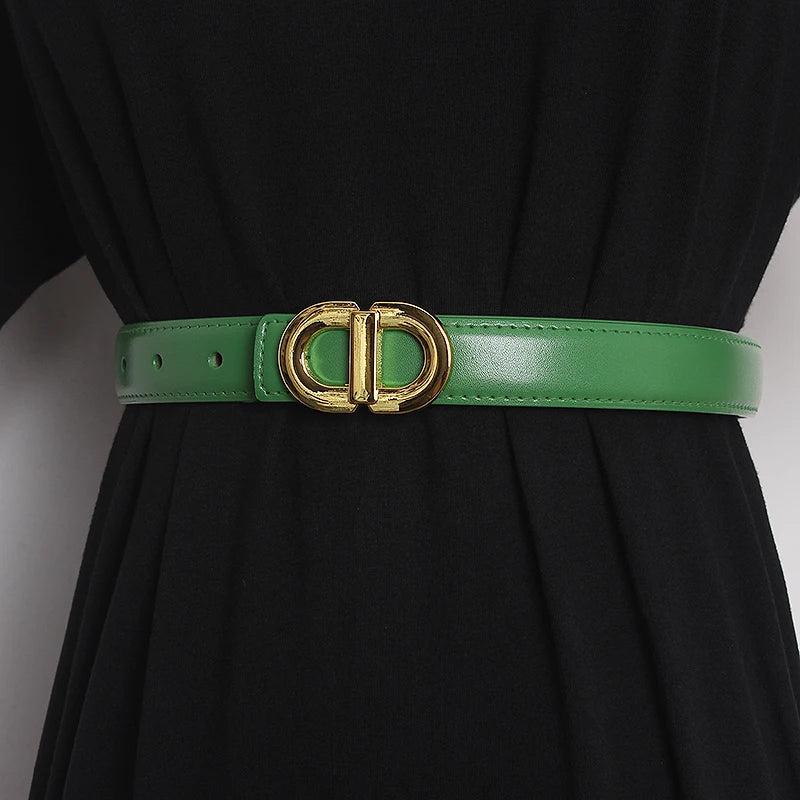 Green narrow leather waist belt with gold-tone double D buckle and punched holes
