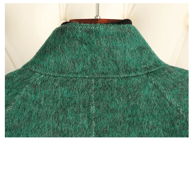 Green wool-blend coat back neckline and yoke seam