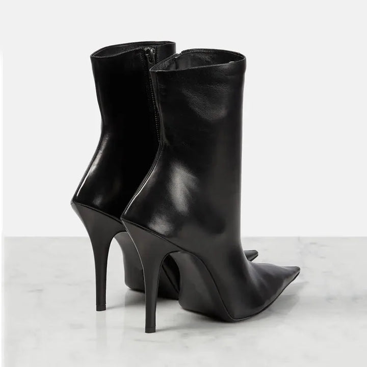 Black side-zip pointed-toe heeled ankle boots with slim stiletto heel