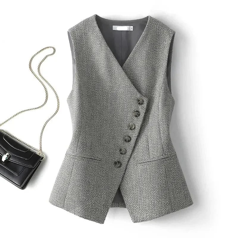 Grey sleeveless waistcoat with V-neck, button-front detail, and tailored waist