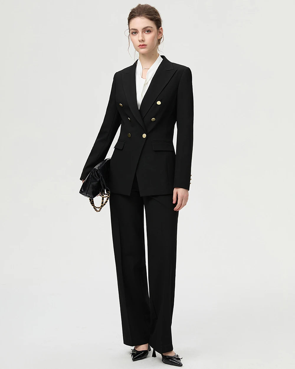 Women’s black two-piece office suit set with gold-button blazer and wide, straight trousers