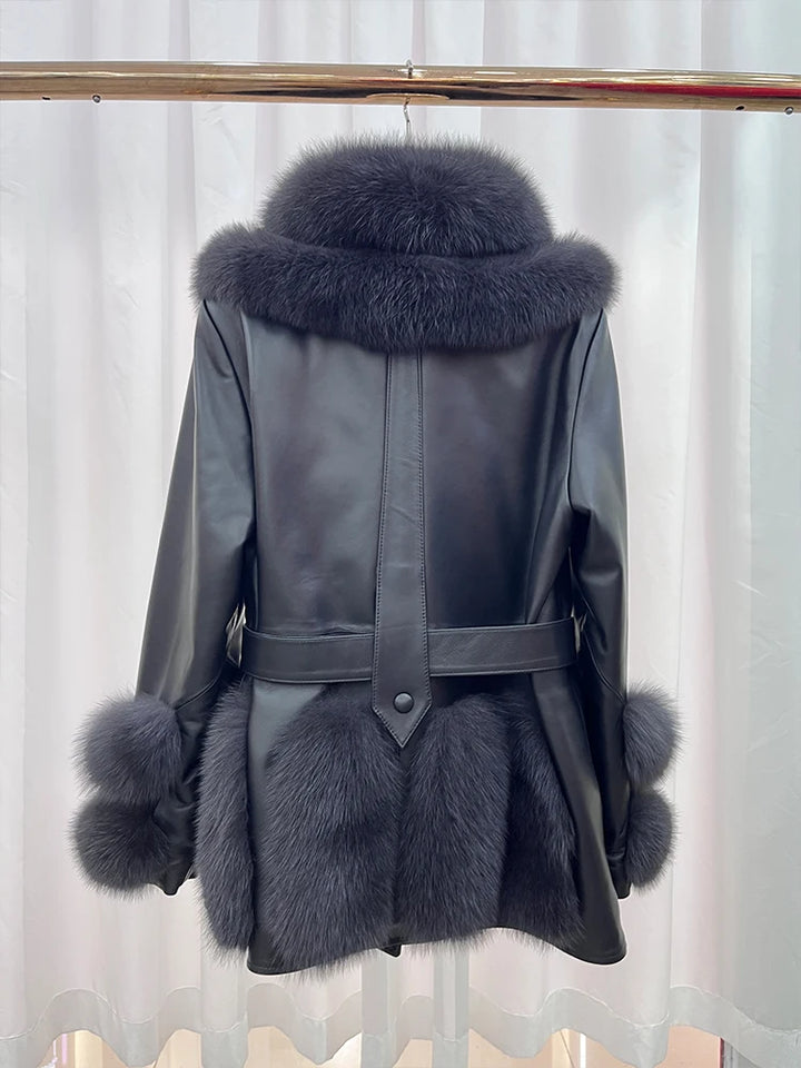 Back view of black leather coat with high faux-fur collar, waist belt, and fur cuffs