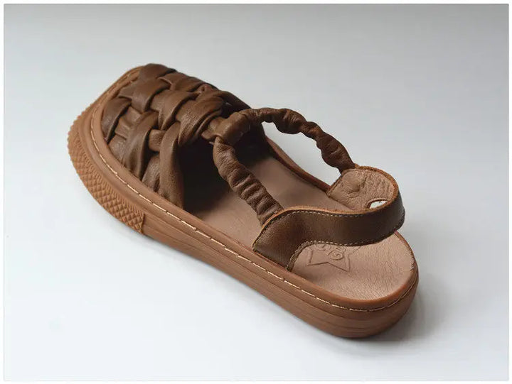 Coffee brown woven leather casual slip-on shoe, side view with braided upper and sole