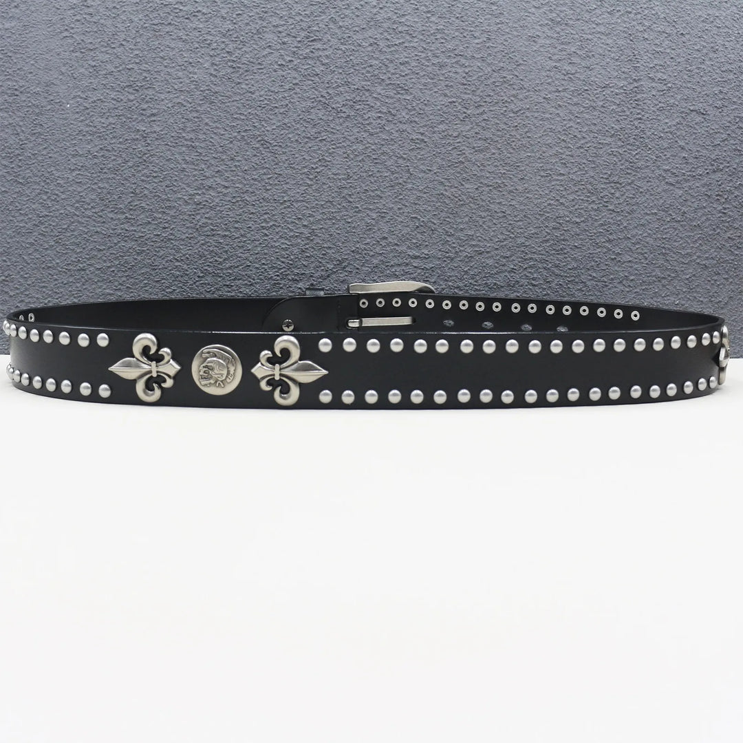 Black leather belt with silver studs and decorative buckles on a gray background