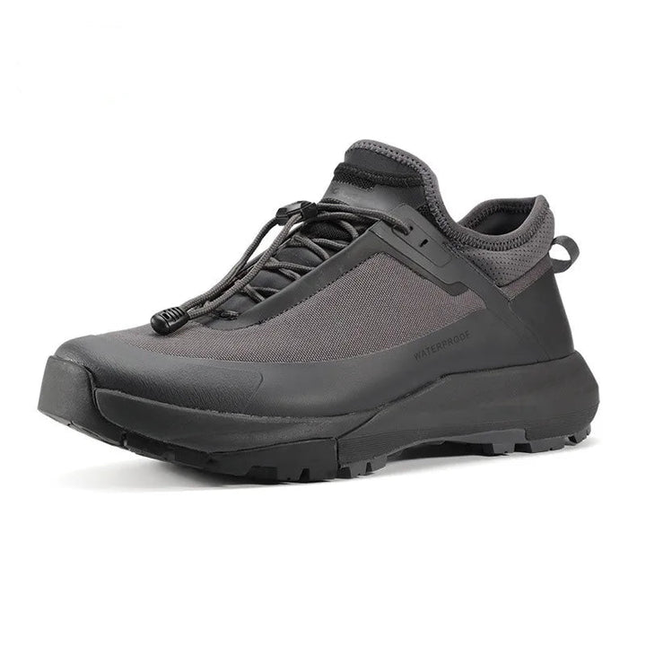 Gray athletic shoe on a white background with &