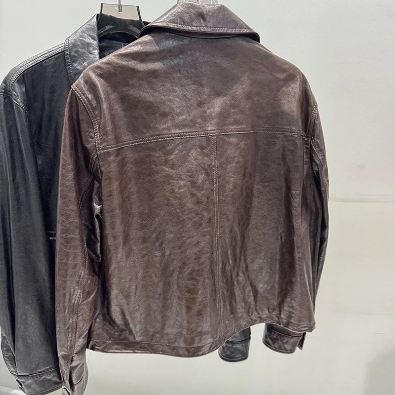 Women’s distressed leather jacket back view, full-length sleeves, zip-front