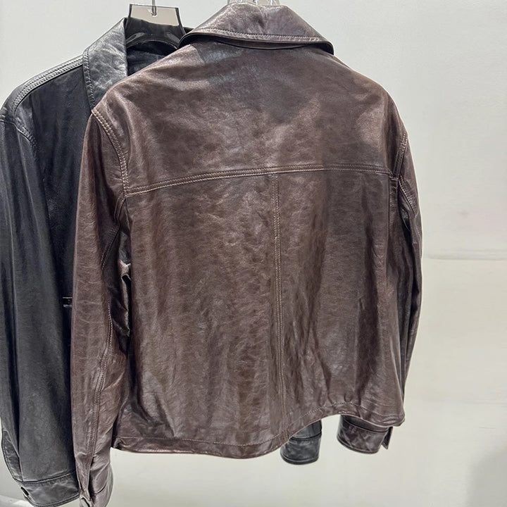 Women’s distressed leather jacket back view, full-length sleeves, zip-front