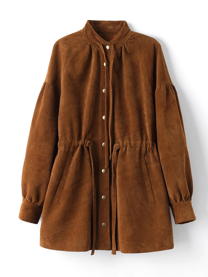 Tan mid-length jacket with button front and gathered cuffs, drawstring waist