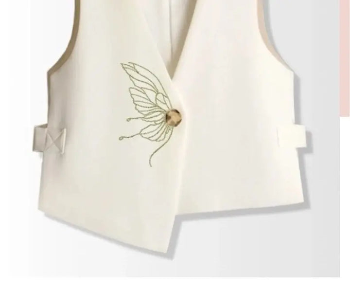 Off-white embroidered irregular waistcoat with bird motif and gold button