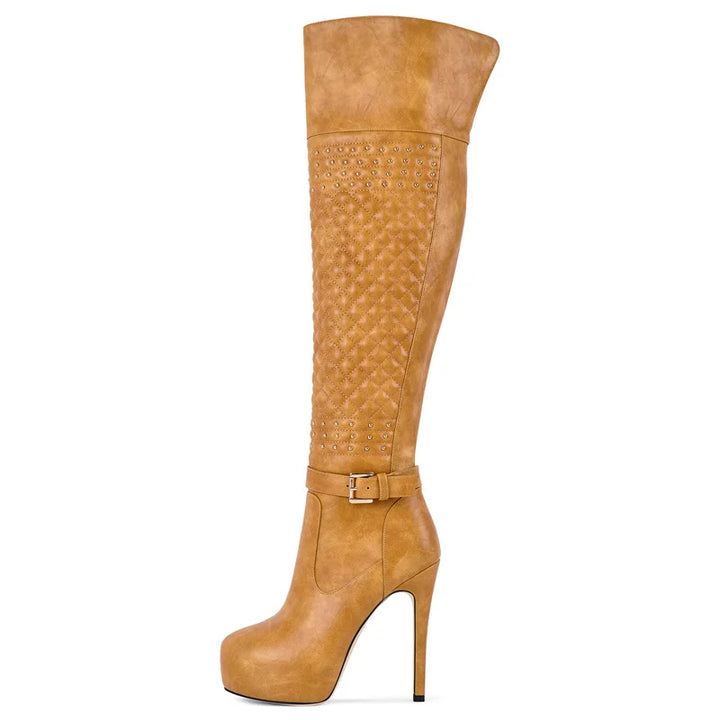 Tan over-the-knee boots with studded band, quilted texture, stiletto heel.
