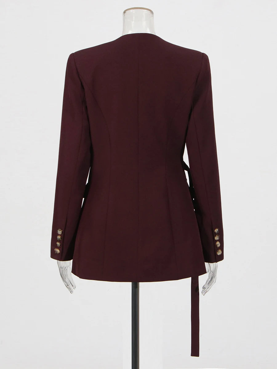 Burgundy red asymmetrical blazer with vented back and gold-button cuff details