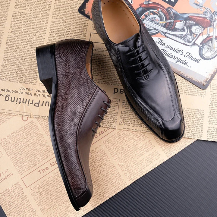Dark brown leather oxford dress shoes with lace-up vamp and low block heel.
