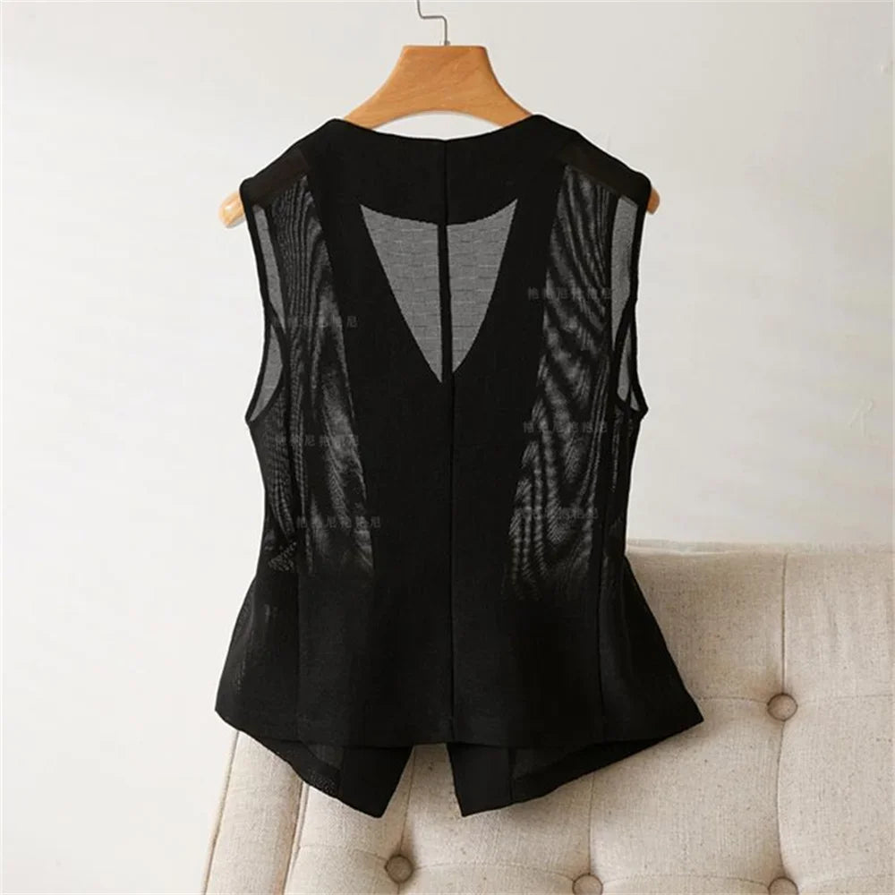 Black sleeveless short waistcoat, back view with V-shaped mesh insert