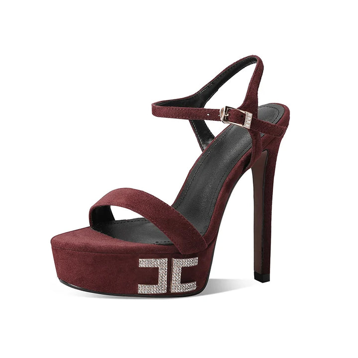 Burgundy suede platform heeled sandals with ankle strap and metal buckle