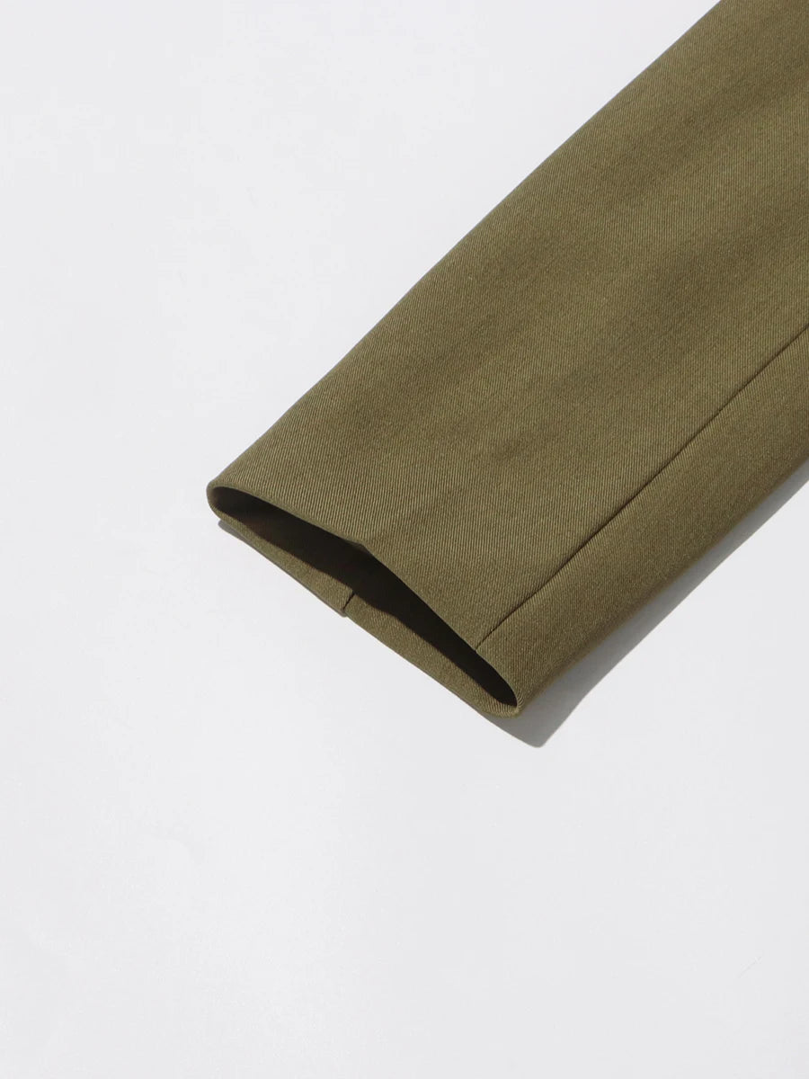 Olive-green blazer curved hem and lower seam