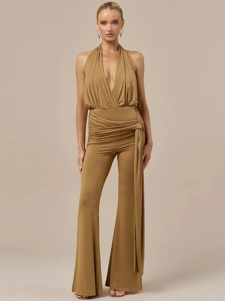 Brown halter backless ruched jumpsuit with draped bodice and wide bell-leg pants