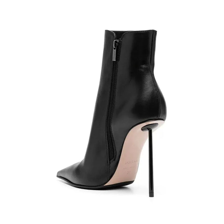 Black pointed-toe ankle boots with full side zipper and stiletto heel