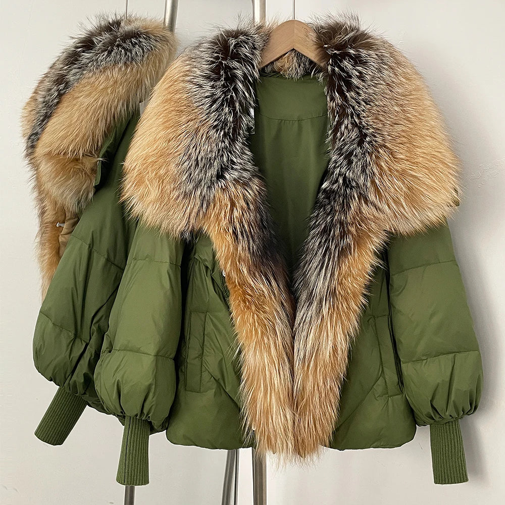 Green puffer coat with tan and gray faux-fur hood trim, ribbed knit cuffs