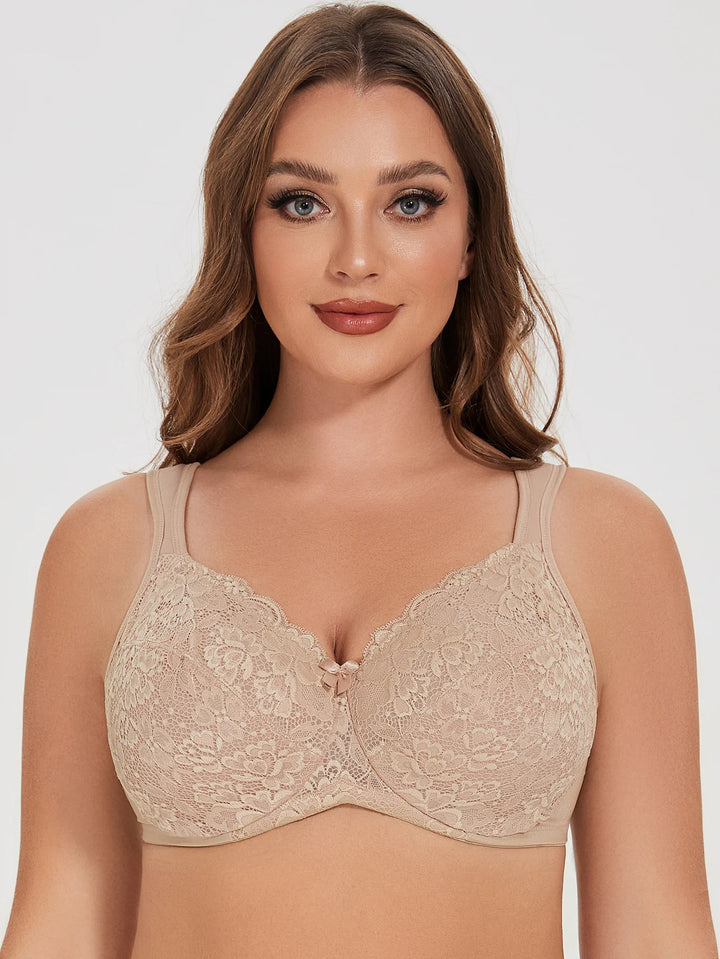 Beige lace underwire bra with scalloped cups and center bow detail