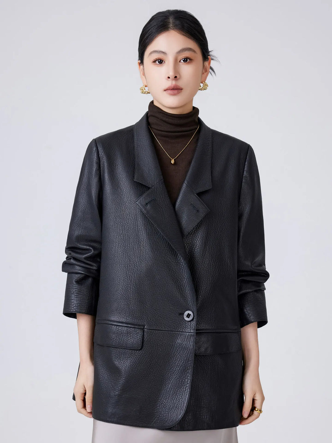 Women's black leather blazer jacket with notch lapels, button front, patch pockets