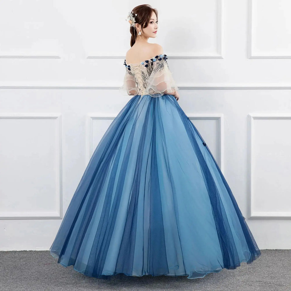 Blue ball gown with off-shoulder embroidered bodice, tulle sleeves, and tiered full skirt