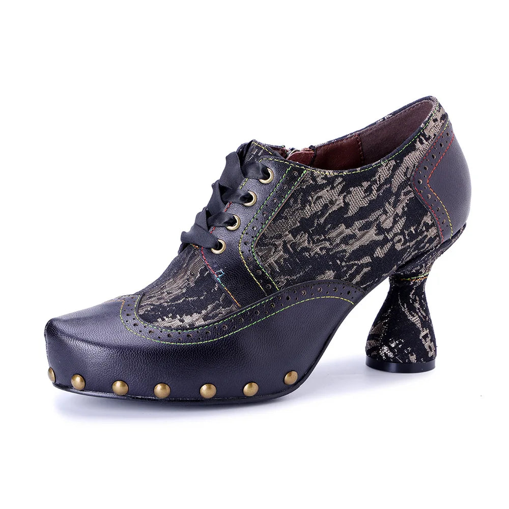 Women’s leather heel pumps, dark blue lace-up with snake-print upper and riveted sole