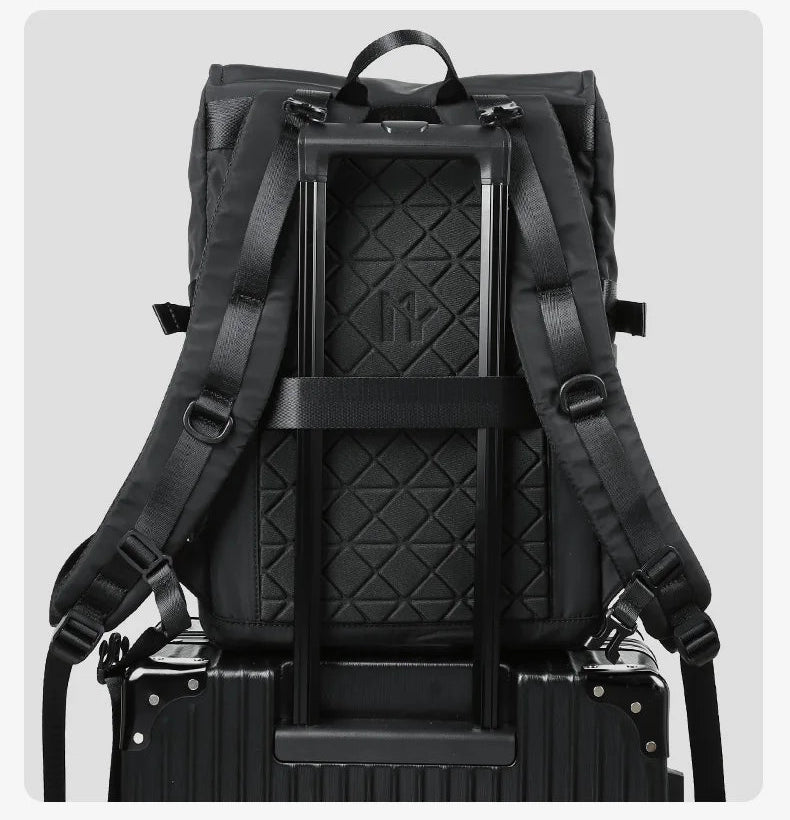 Black backpack with trolley strap fixation and reinforced handle frame