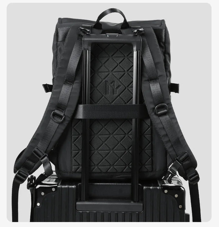 Black backpack with trolley strap fixation and reinforced handle frame