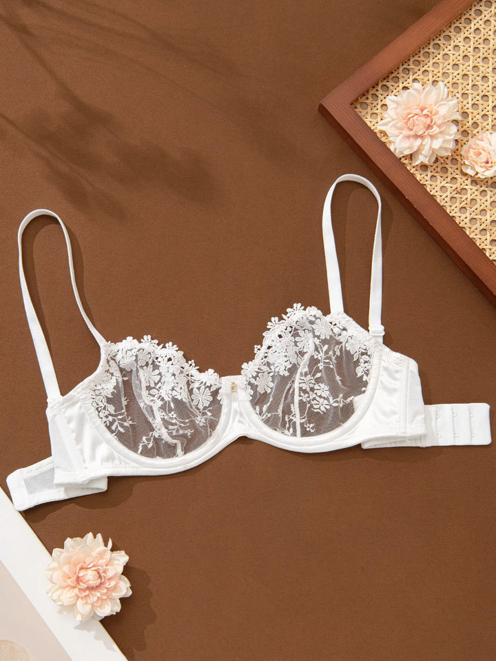White sheer lace embroidered bra with floral embroidery cups and front hook closure