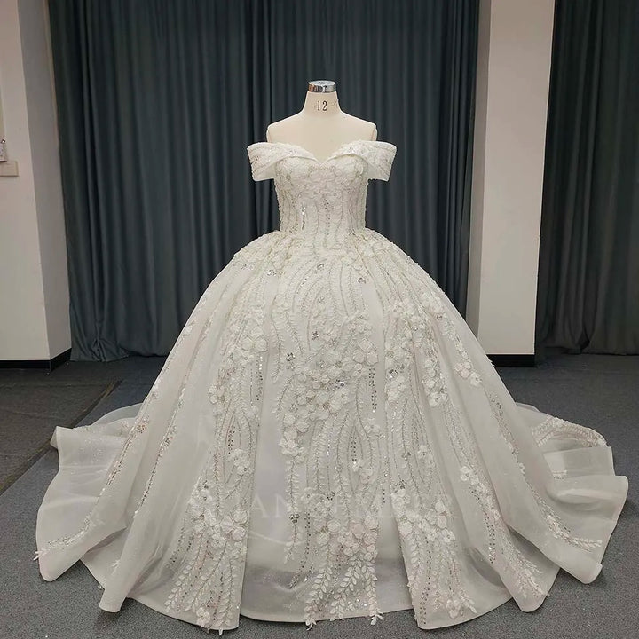 White lace bride dress with off-shoulder neckline, beaded bodice, full skirt