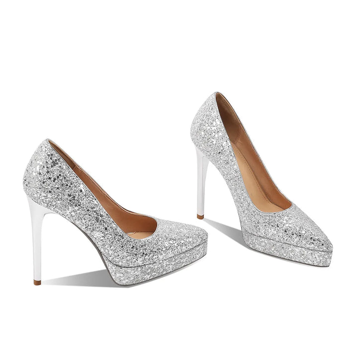 Sparkly sequin pointed heel pumps, glitter silver pair with slim high stiletto heels.